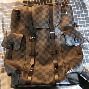 - Louis Vuitton black christopher bookbag -